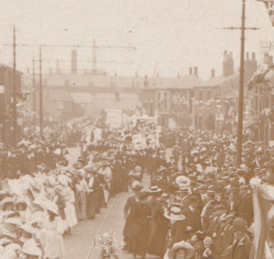 Postcard: Postcard, Unidentified Busy Procession Through Street. Real Photograph.: catalogue image 3