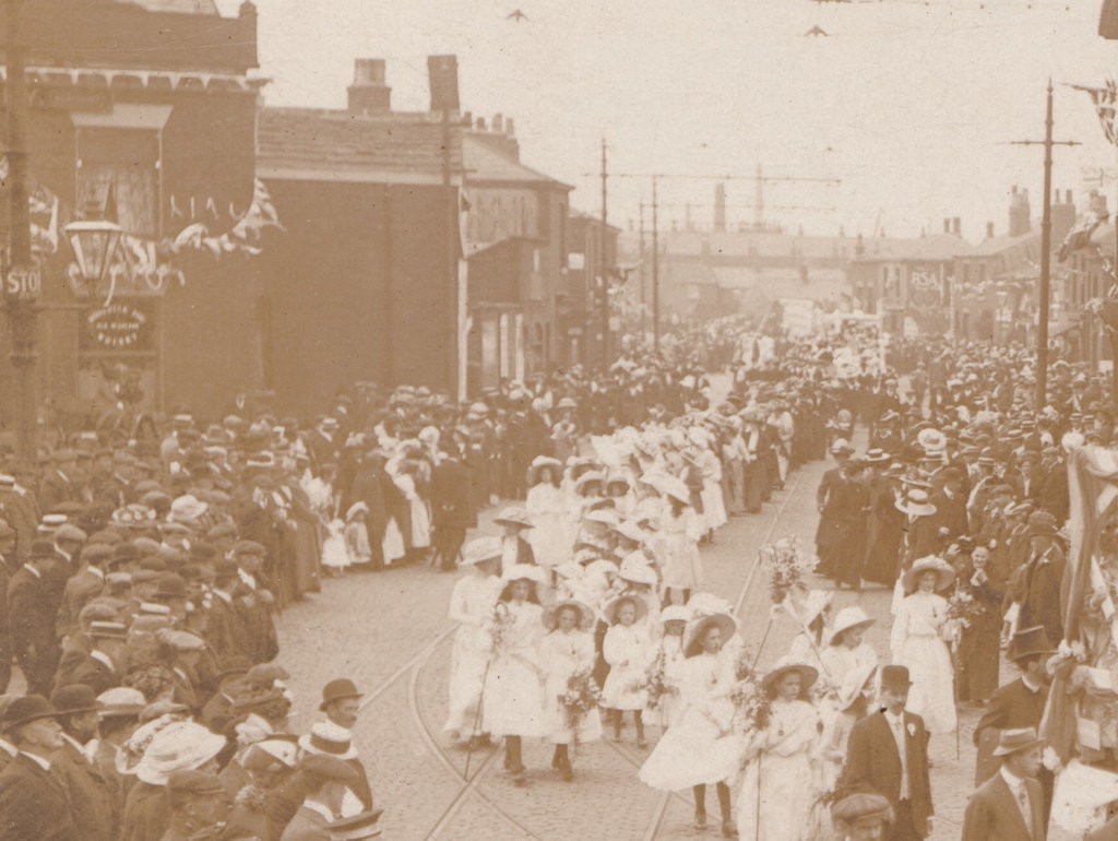 Postcard: Postcard, Unidentified Busy Procession Through Street. Real Photograph.: catalogue image 6